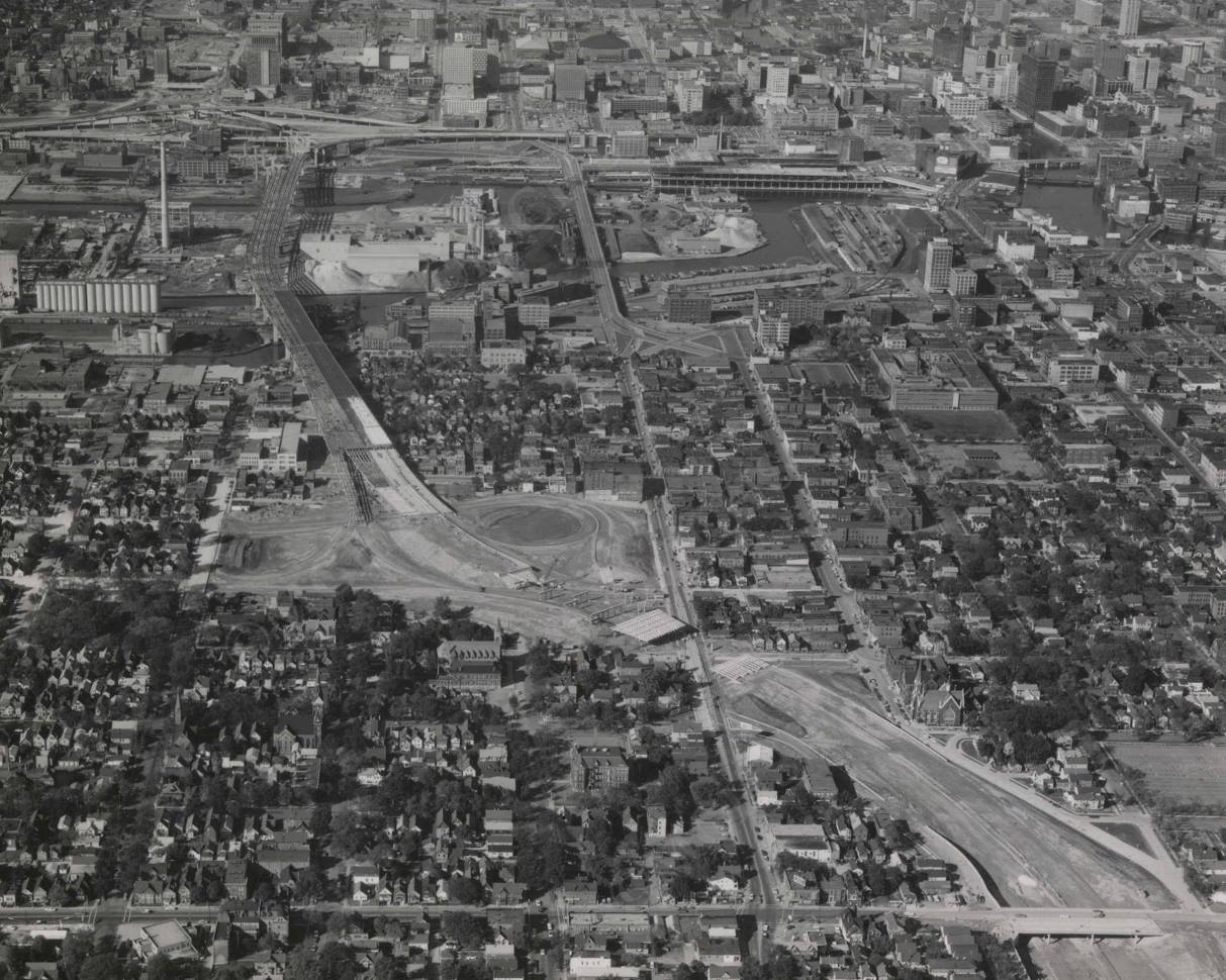 Walker’s point looking North - Subtitle: Walker’s Point neighborhood looking North to the Marquette Interchange. Photo courtesy of the Milwaukee County Historical Society