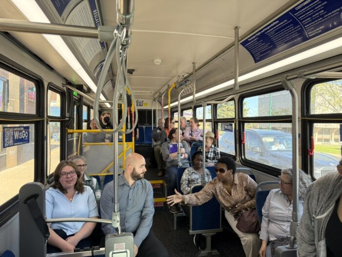 A group of people on a city bus.