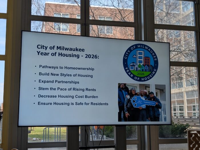Presentation screen showing housing goals at the “Housing Justice for Milwaukee: Community Land Trusts, Equity Strategies, and the Path to a Justice-Oriented City”