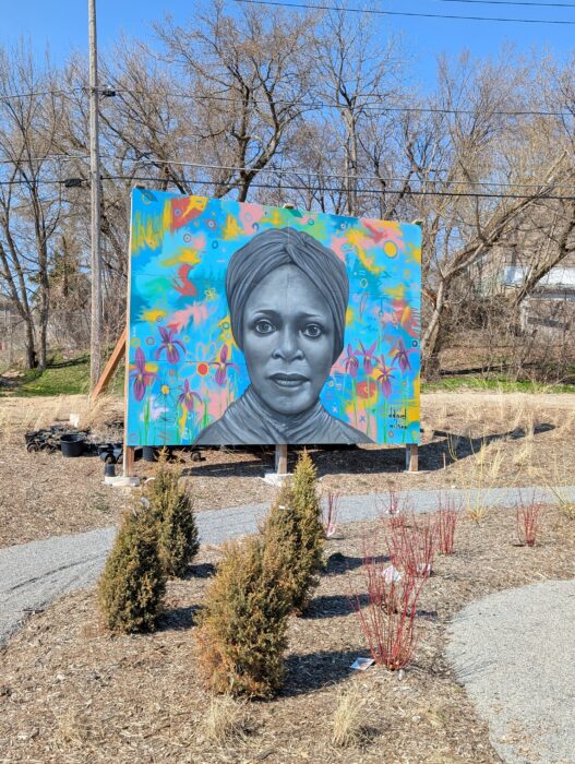 Painting. Beautified part of the northwest corner of the intersection of 35th and Vliet in Milwaukee with public art.