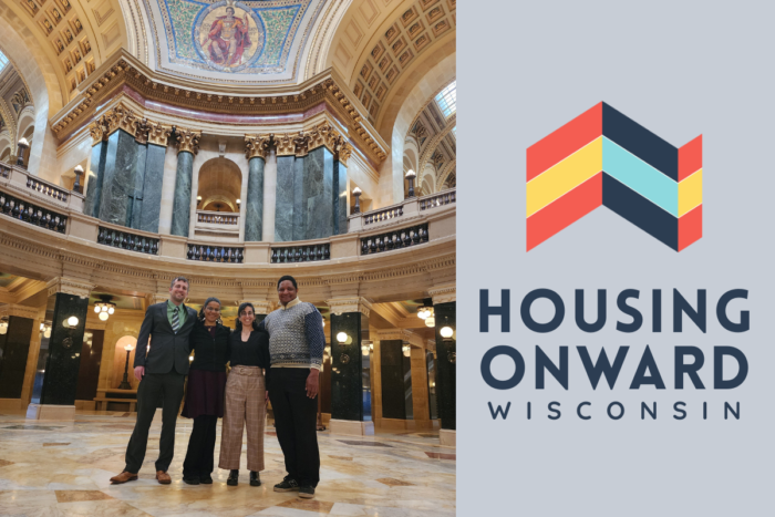 1000 Friends of Wisconsin team pictured at State Capitol dome with Housing Onward logo on right