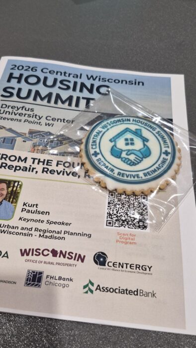 Housing Summit Flyer with custom-made Housing Summit Sugar Cookie in cellophane