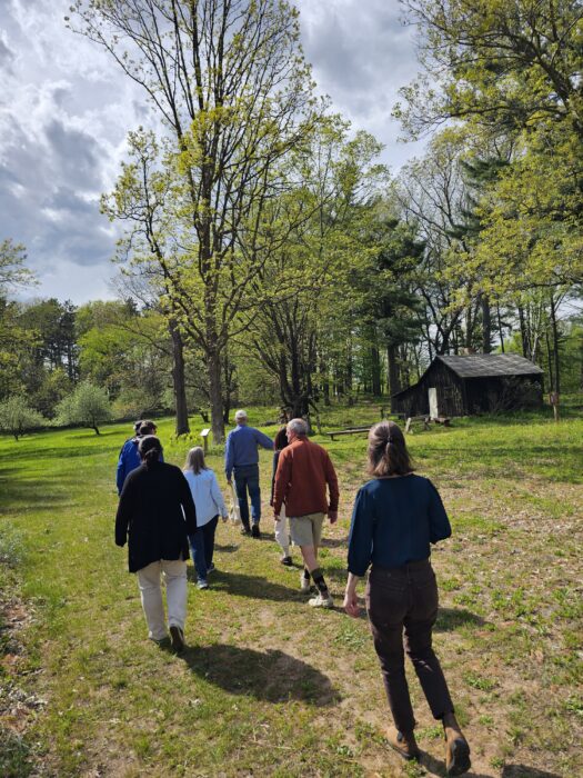 Participants walking in nature at Aldo Leopold Center